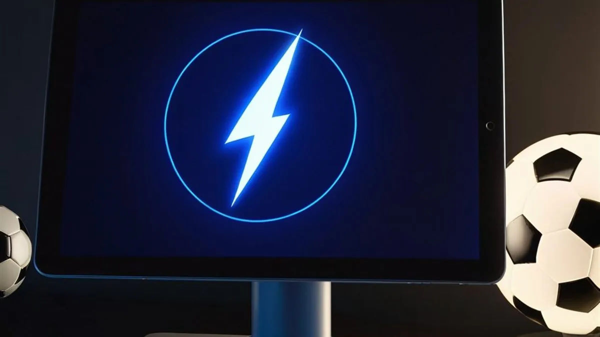 Monitor con un rayo azul dentro de un círculo en pantalla junto a balones de futbol